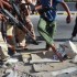 Rebeldes líbios controlam quase toda Trípoli, e dizem não saber o paradeiro de Kadhafi