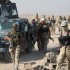 Forças iraquianas cercam cidade dominada pelo Estado Islâmico